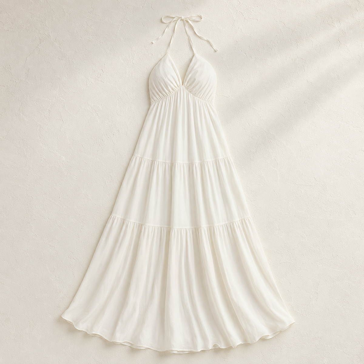 Robe longue Élise ivoire dos nu et jupe à volants