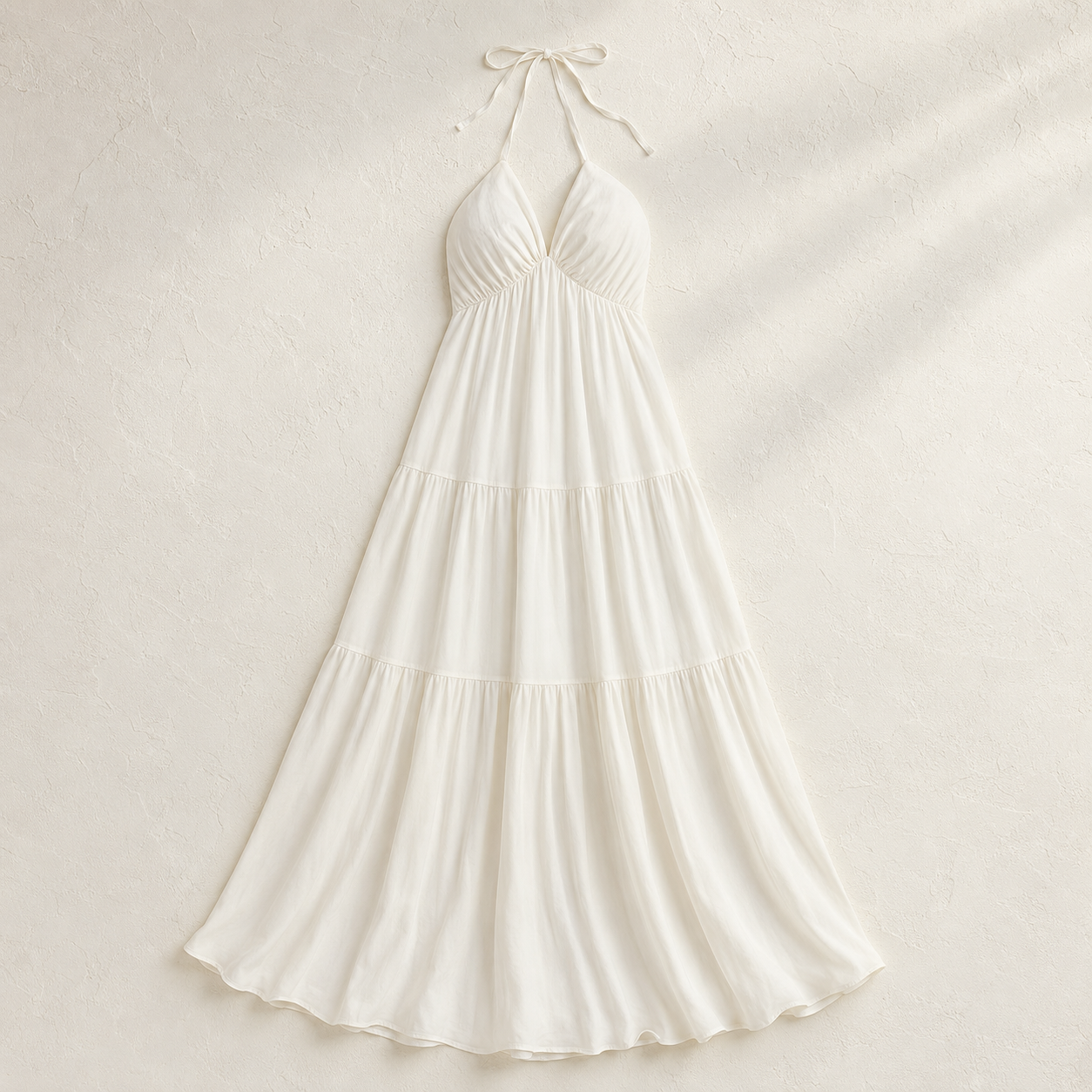 Robe longue Élise ivoire dos nu et jupe à volants